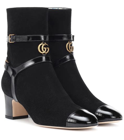 all black gucci boots.